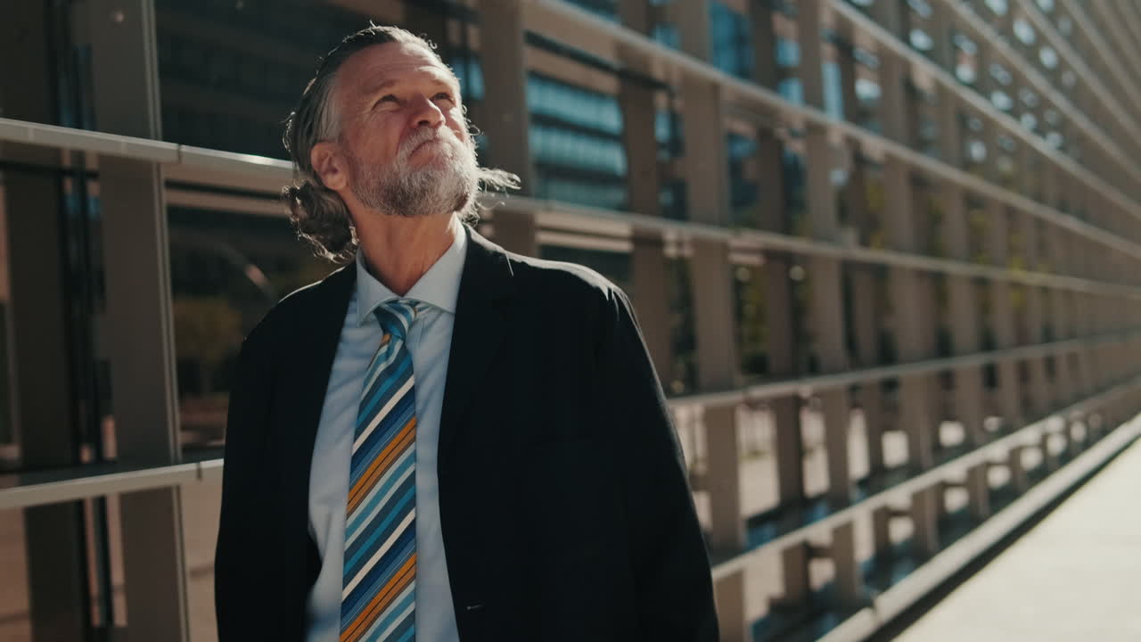 Senior Businessman Enjoys Coffee Outside Office