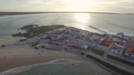 shot over the beautiful island of baleal in peniche , towards the sun