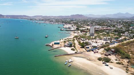 tropical beach and city coastline, sunny day in la paz, baja california sur, mexico