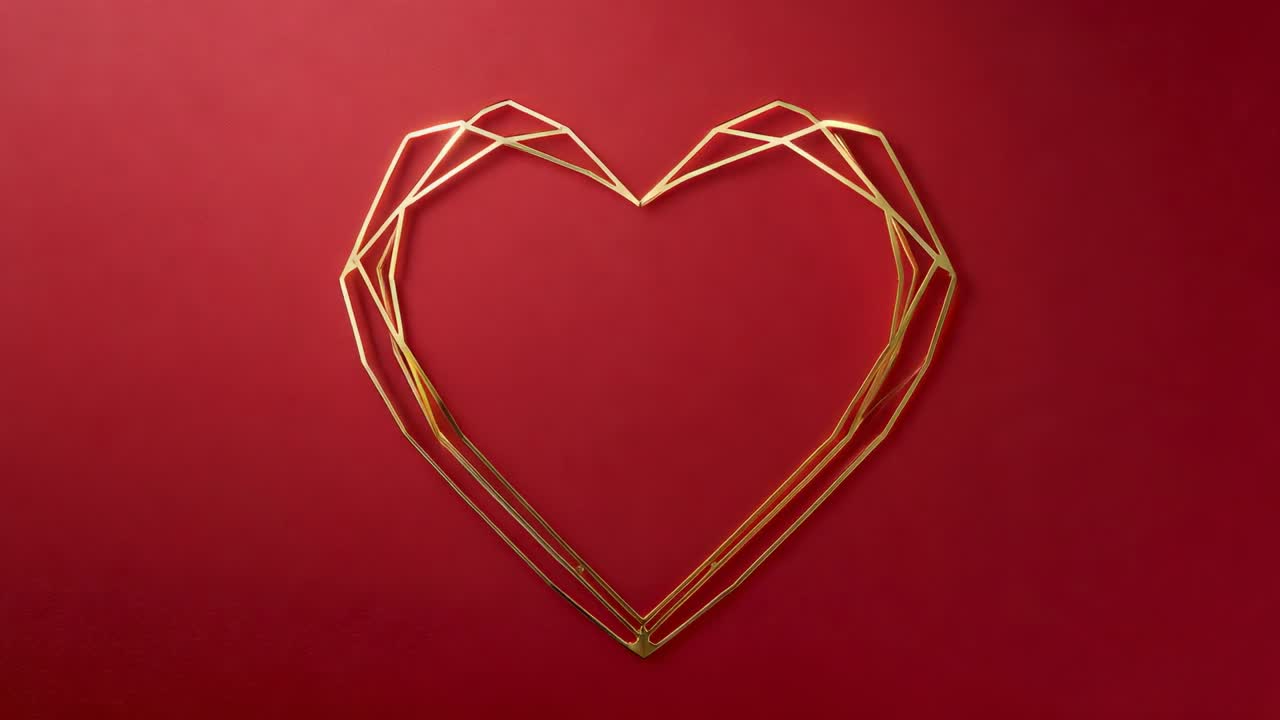 Scultura di un cuore fatto con fili d'oro in trasformazione che si piega e scorre su giunti incernierati in un set da studio, in ciclo