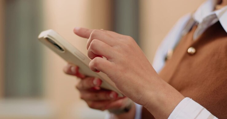 Close-up of a Person Using a Smartphone