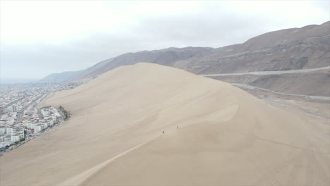 aerial drone shot of famous cerra dragon in the modern city of iquique,tarapaca chile