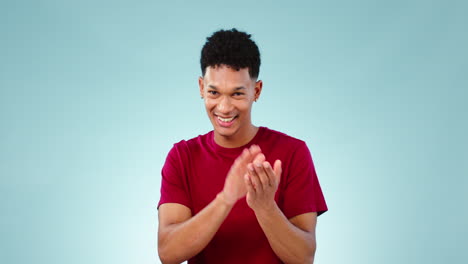 face, happy man and applause in celebration