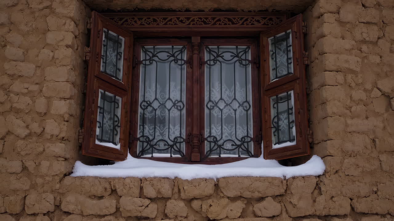 Snowy Mountain Village with Adobe Houses