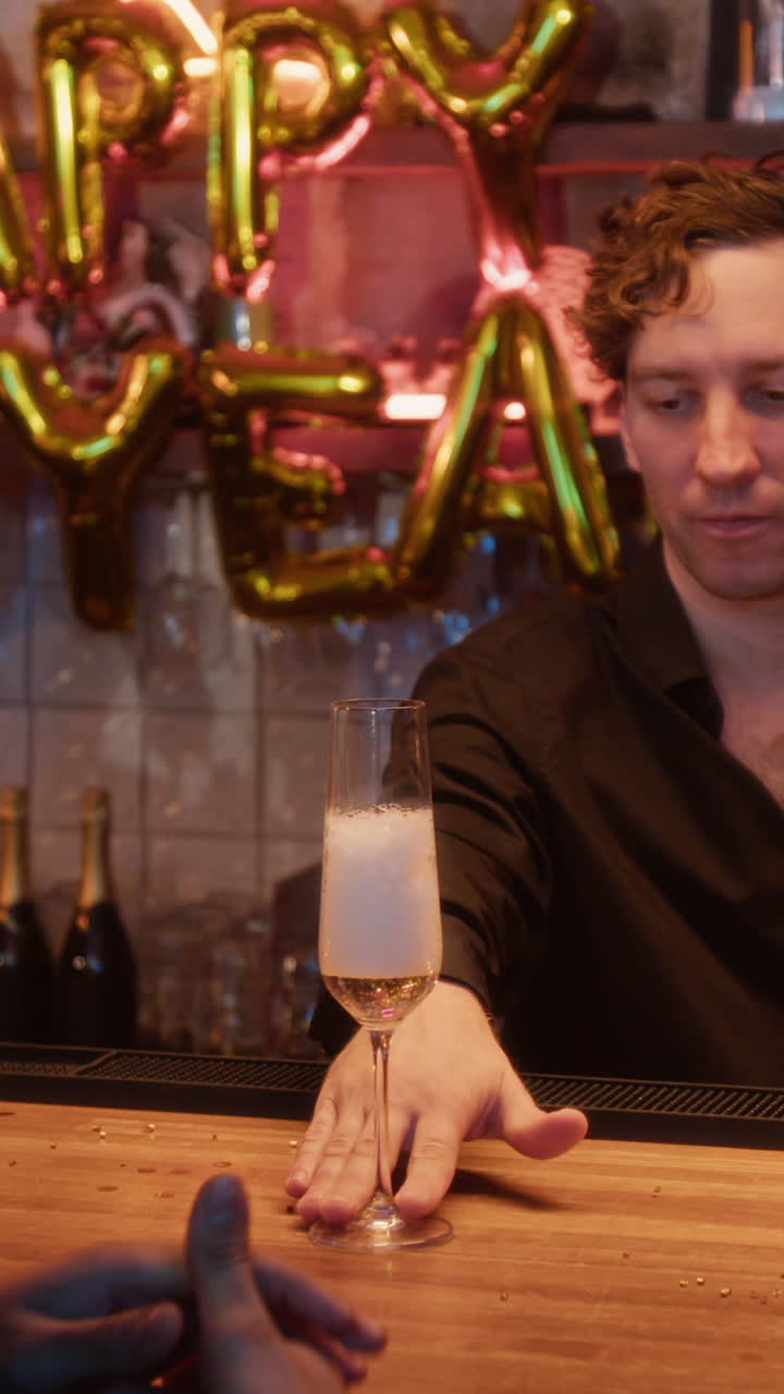 Bartender Pouring Champagne at a Celebration