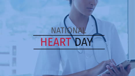 animation of national heart day text over caucasian female doctor