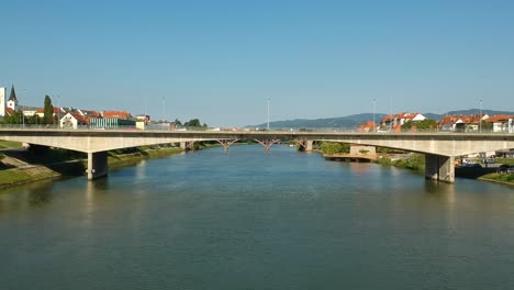 flying a drone above drava river in maribor, slovenia