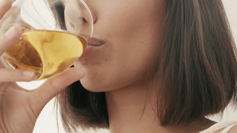 woman drinking wine or cocktail