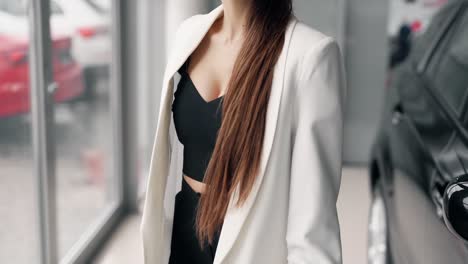 close-up of a white jacket on a sexy girl