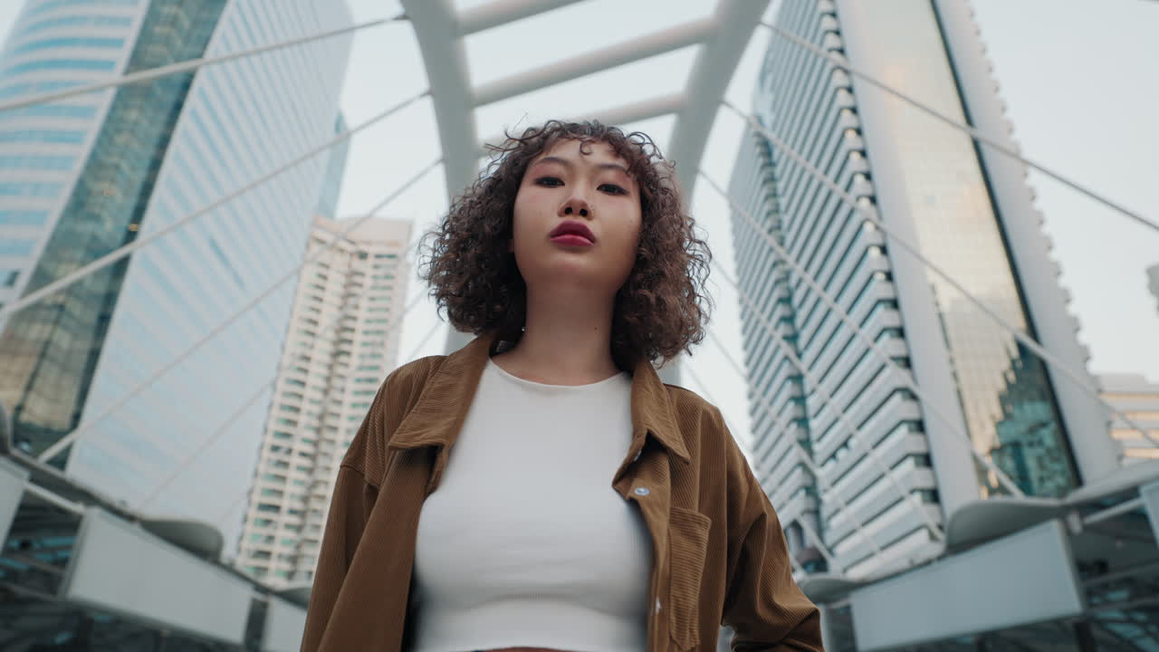 Young Woman in Cityscape