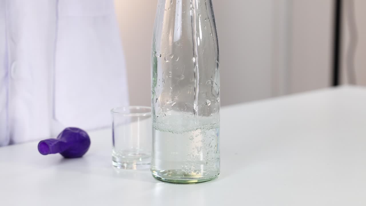 Science Experiment with a Water Bottle and Balloon