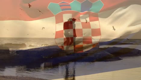 Animation-of-flag-of-croatia-over-african-american-couple-at-beach