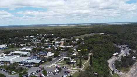 Flying-over-a-parking-lot-in-a-small-country-town