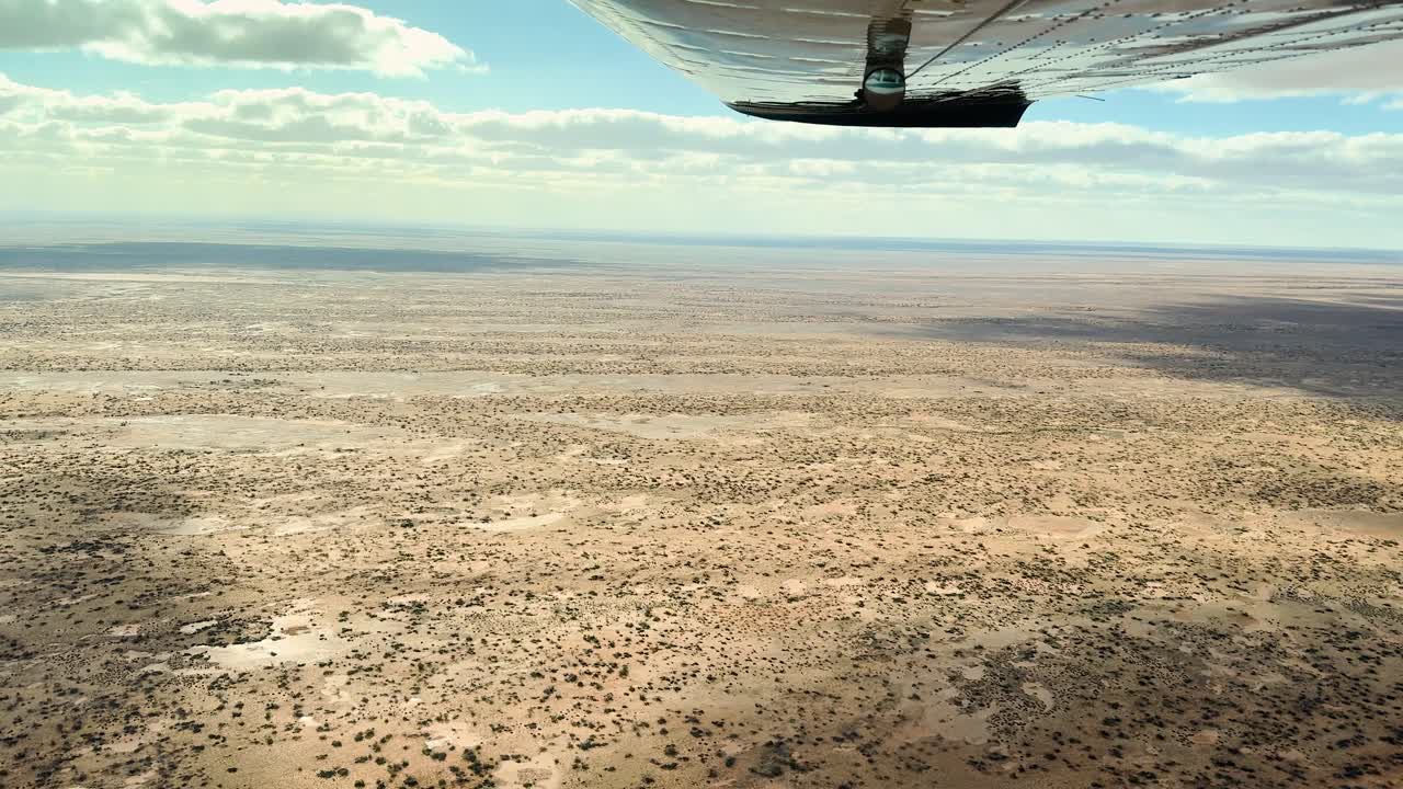 Experience a rare aerial perspective of the Desert near Lake Eyre in South Australia's vast outback.