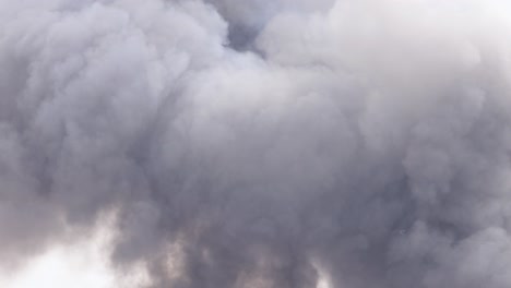 thick, swirling smoke fills the scene, creating a dramatic, chaotic atmosphere with dynamic movement and varying light