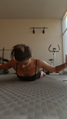 woman stretching in a gym