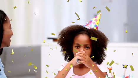 animación de confeti cayendo sobre la familia divirtiéndose en la fiesta de cumpleaños