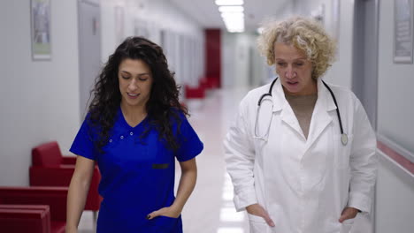 medical professionals in hospital hallway