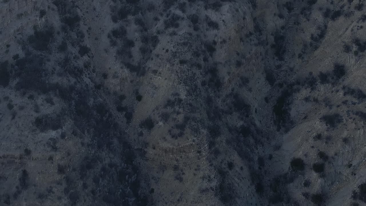 Aerial view of rocky landscape in Morocco captured during evening hours