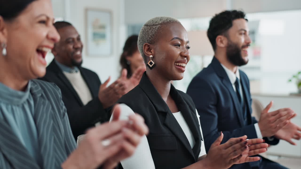 Enthusiastic Audience Applauding at a Business Presentation