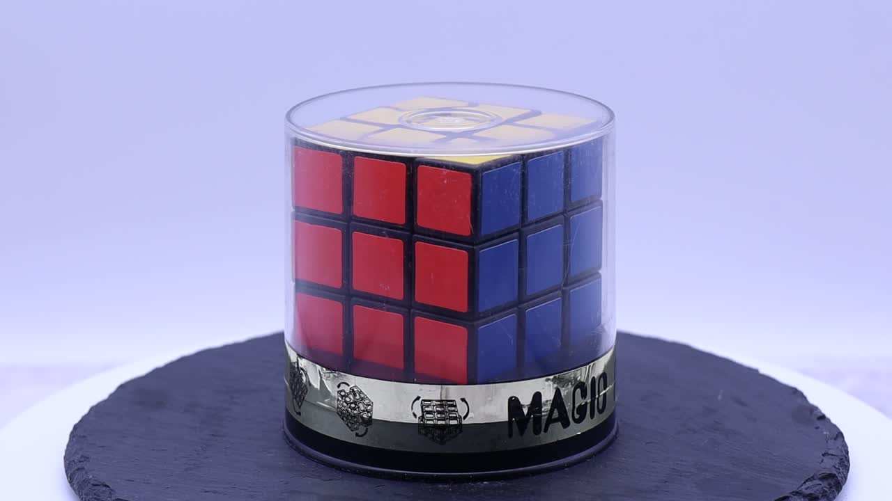 Vintage Rubik's cube puzzle rotating on a turntable