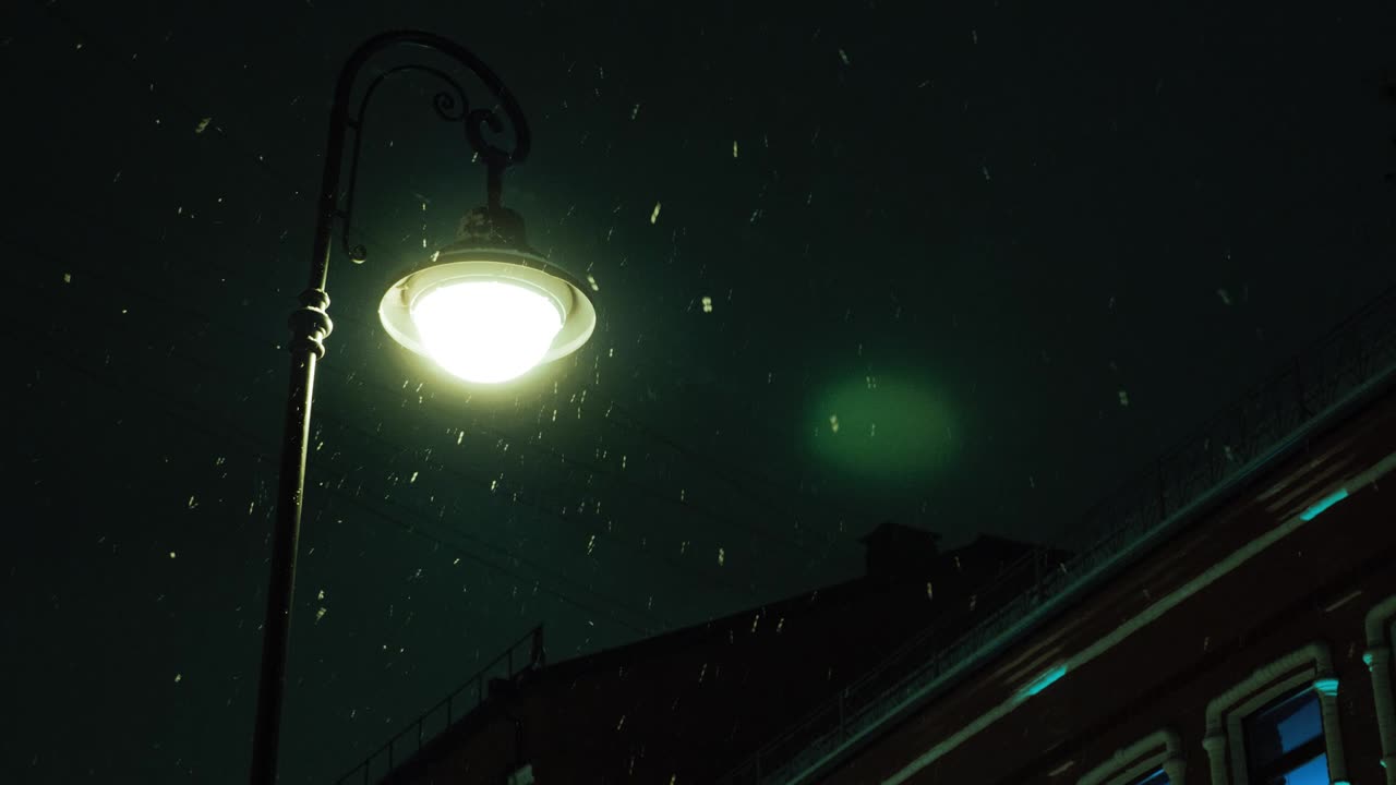 Street lamp at night in the snow