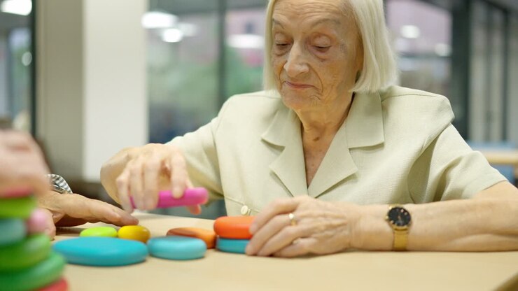 Elderly woman playing a cognitive game