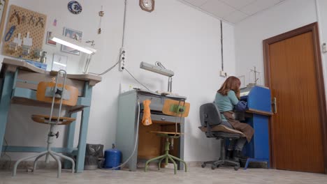 jewelry workshop interior with craftswoman