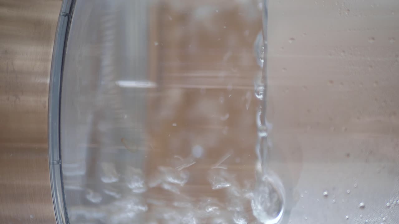 Pouring Water into a Blender