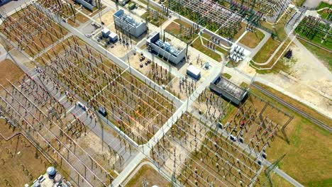 flying above electrical substation - power station - drone shot