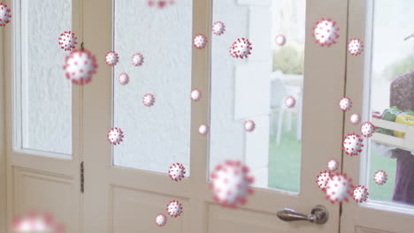 animation of covid 19 cells floating over delivery man in face mask by door