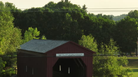 rising on the wooden covered bridge in the state of minnesota, zumbrota, usa