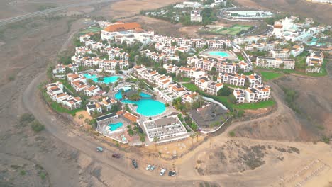 Aerial-view-of-a-luxury-hotel-along-the-coast-Hotel-Princess-Fuerteventura,-Canary-Islands,-Spain