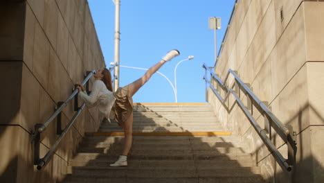urban dancer on city stairs