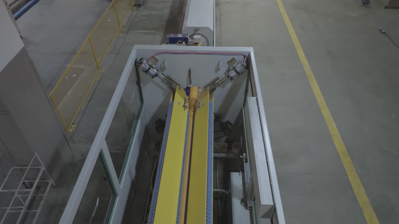 Aerial view capturing an automated machine used at manufacturing of PVC pipes at Karachi, Pakistan.