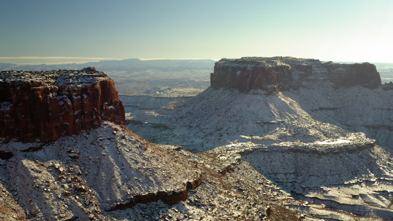Snow-covered desert mesas and canyons in winter