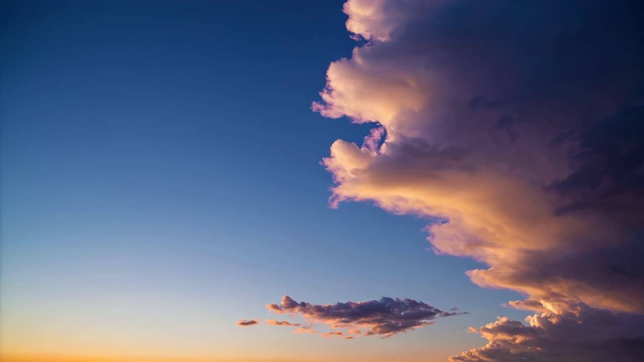 Dramatic sunset sky with vibrant clouds, captured from a low-angle perspective
