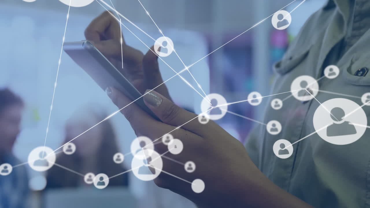 Animation of network of connections with icons over biracial businesswoman using smartphone