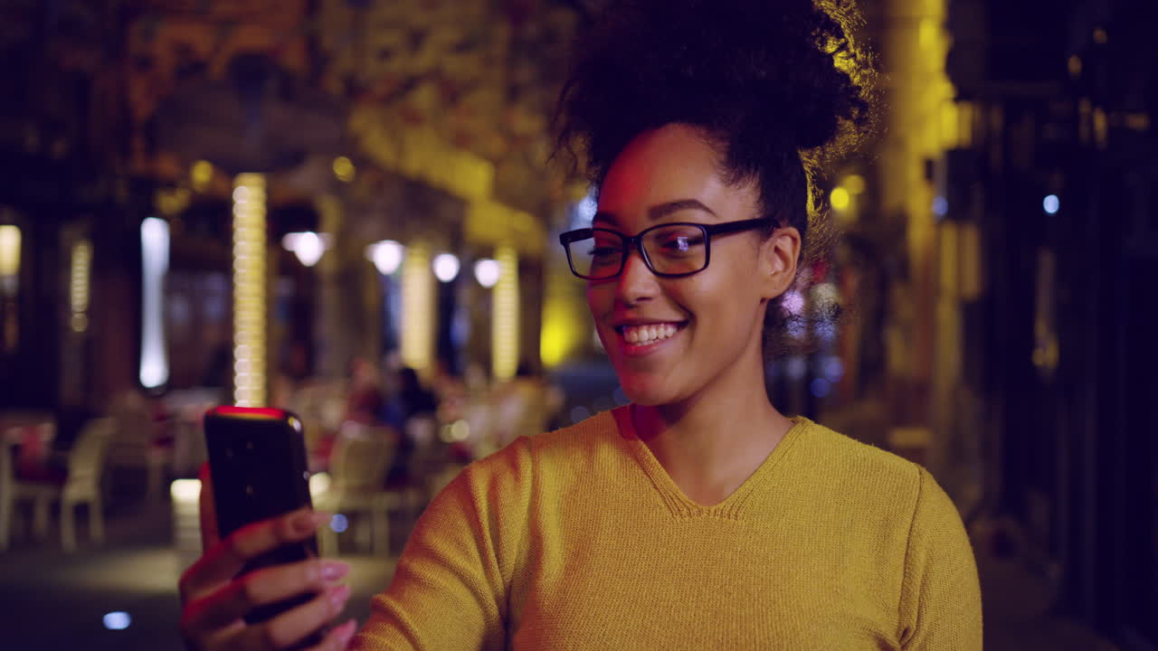 Nighttime City Stroll Woman Smiles At