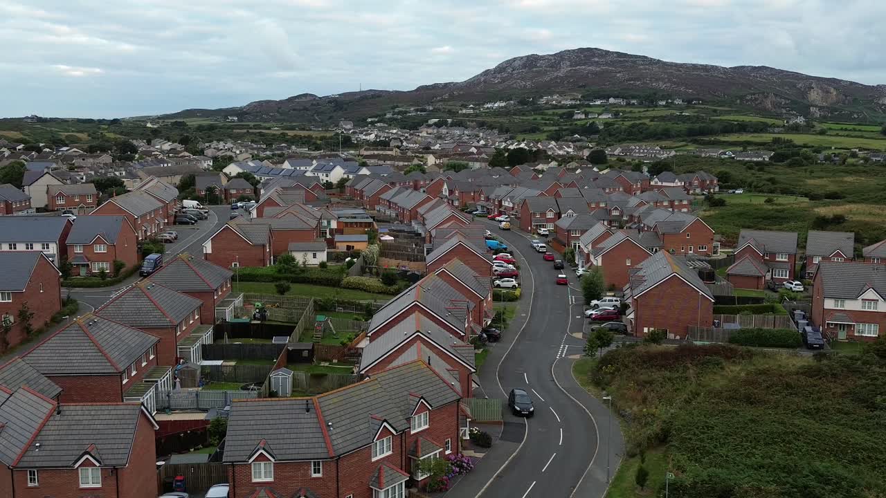 Early morning aerial view across Holyhead homes with mountain in the distance