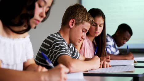 schoolkids studying in classroom 4k