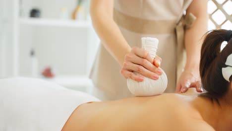 woman receiving a thai massage