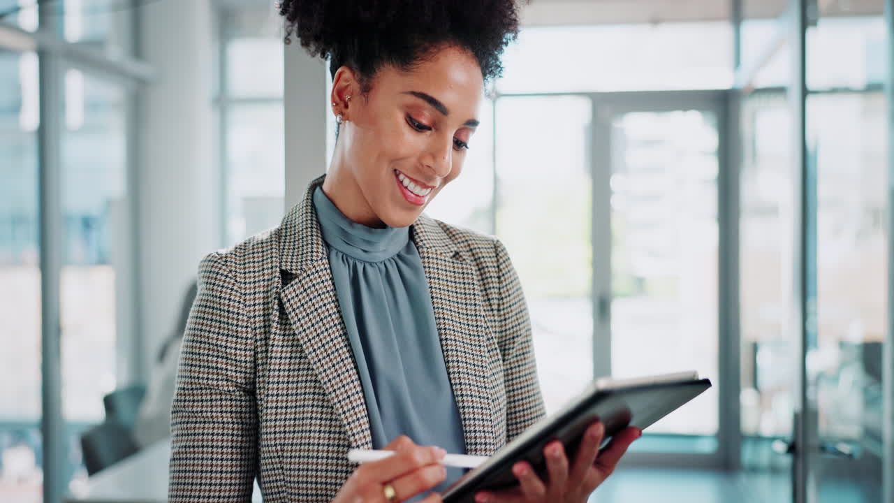 Businesswoman using tablet in office