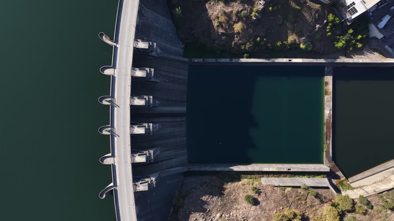 Aerial view of dam sideways drone upstream