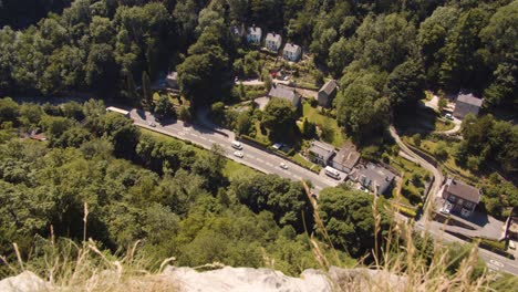 bird's eye view of a small english town located at the base of a tall hill, matlock, derbyshire