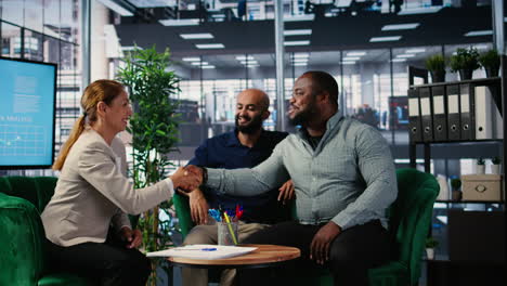 business people signing a legal certified form to ensure their partnership