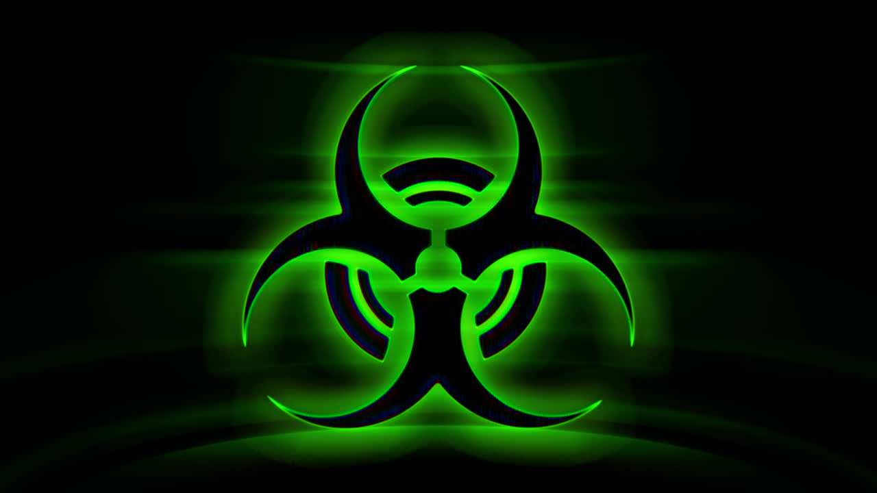 검은 바탕에 박이는 초록색 모양으로 생물학적 위험의 존재를 나타니다.