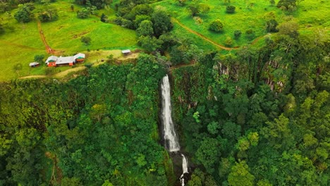 aerial view of a waterfall falling from a plateau