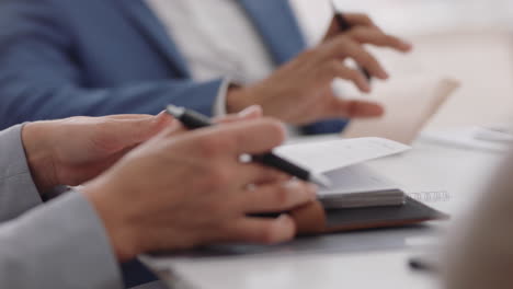 close-up-hands-business-woman-writing-notes-in-office-meeting-brainstorming-ideas-planning-strategy