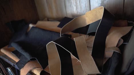 leather scraps lying around leatherworker workshop